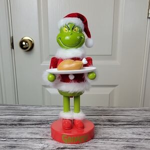 The Grinch Nutcracker Christmas Figurine with Santa Hat